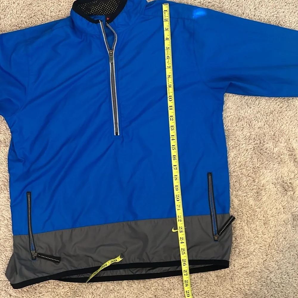 Nike youth L royal blue grey 1/2 zip windbreaker. Loose fit. Great condition